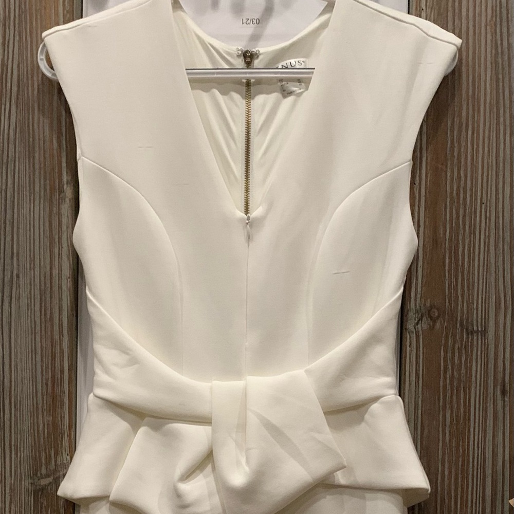 Beautiful white peplum dress